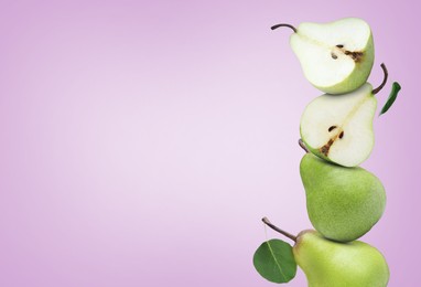 Image of Fresh ripe pears on pale violet background, space for text