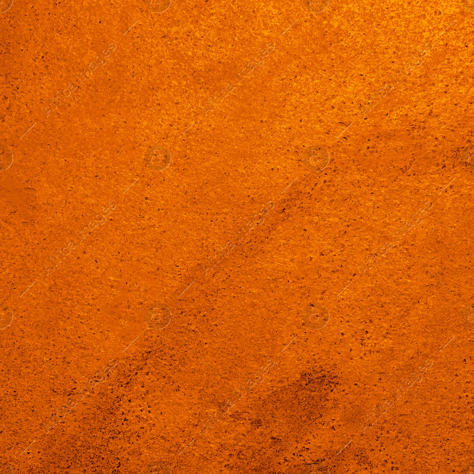 Image of Texture of stone surface painted in orange color as background