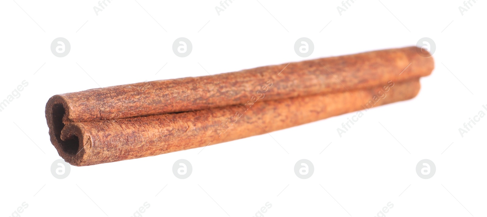 Photo of One aromatic cinnamon stick isolated on white