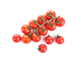 Photo of Branch of fresh cherry tomatoes isolated on white, top view