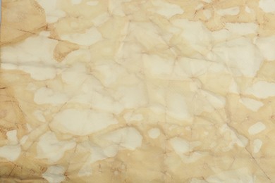 Photo of Sheet of parchment paper as background, closeup