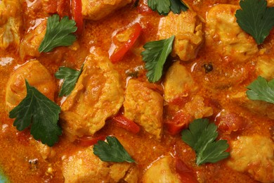 Photo of Delicious chicken curry as background, top view
