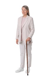 Photo of Senior woman with walking cane on white background
