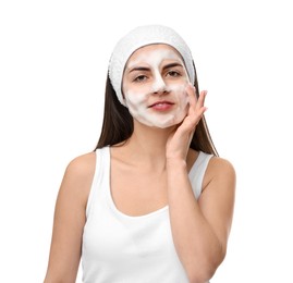 Photo of Young woman with headband washing her face on white background