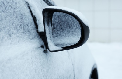 Photo of Car covered with snow outdoors. Space for text