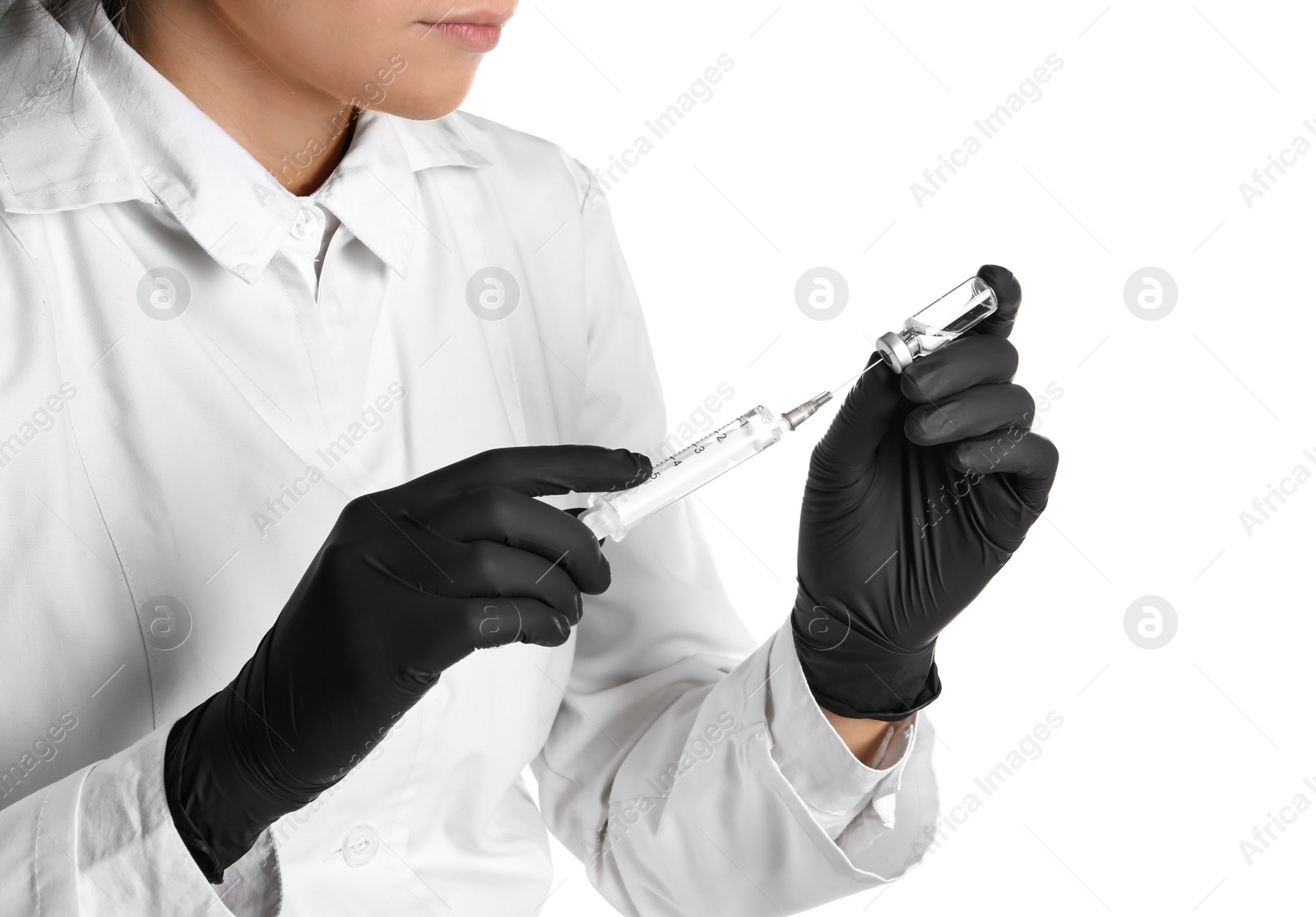Photo of Doctor in medical gloves with syringe and vial on white background