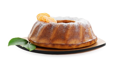 Photo of Homemade yogurt cake with tangerines, powdered sugar and green leaves on white background