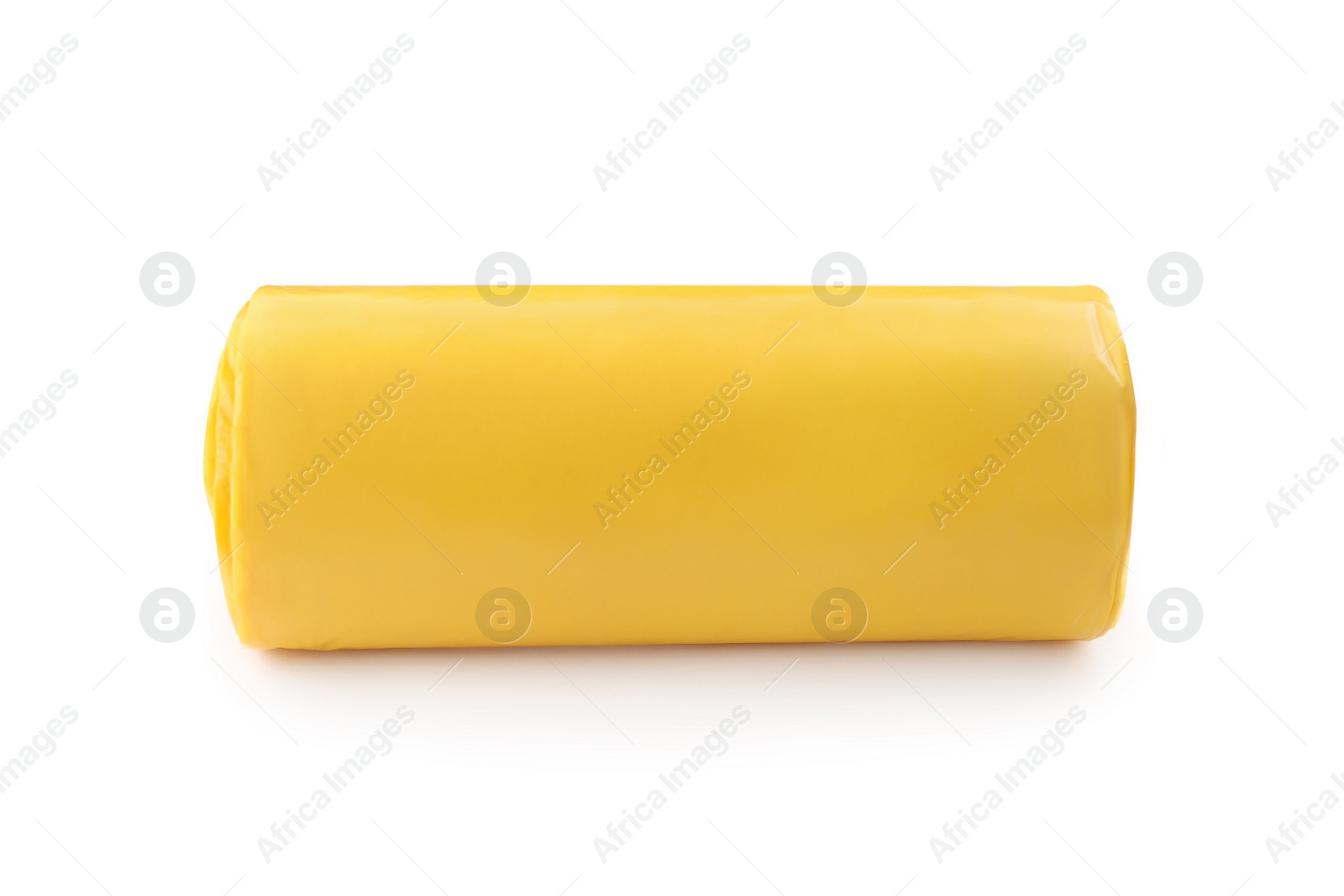 Photo of Roll of yellow garbage bags isolated on white