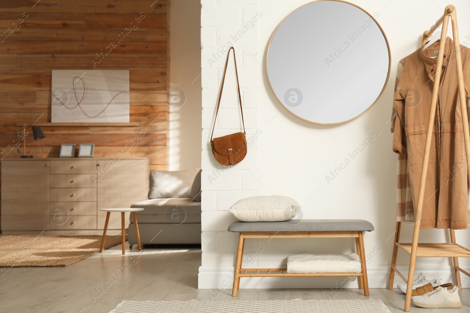 Photo of Modern hallway with stylish furniture and accessories. Interior design