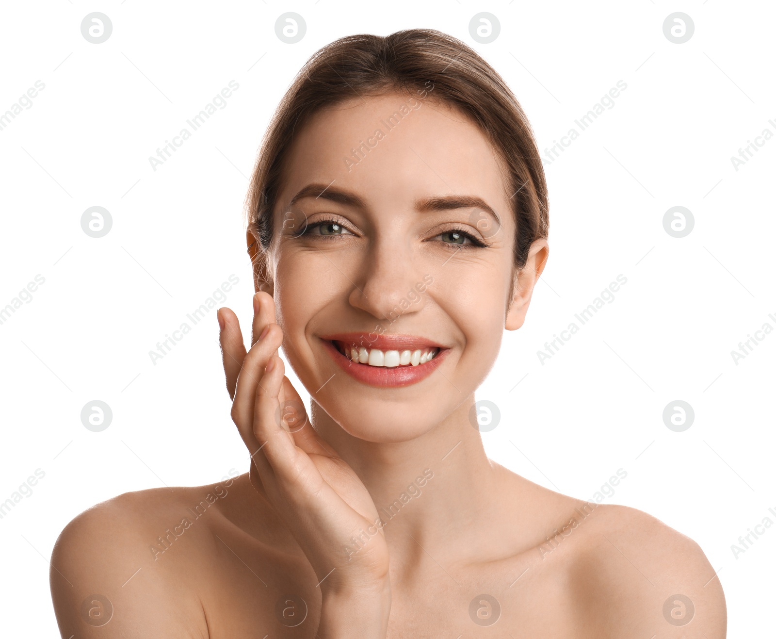 Photo of Young woman applying facial cream on white background