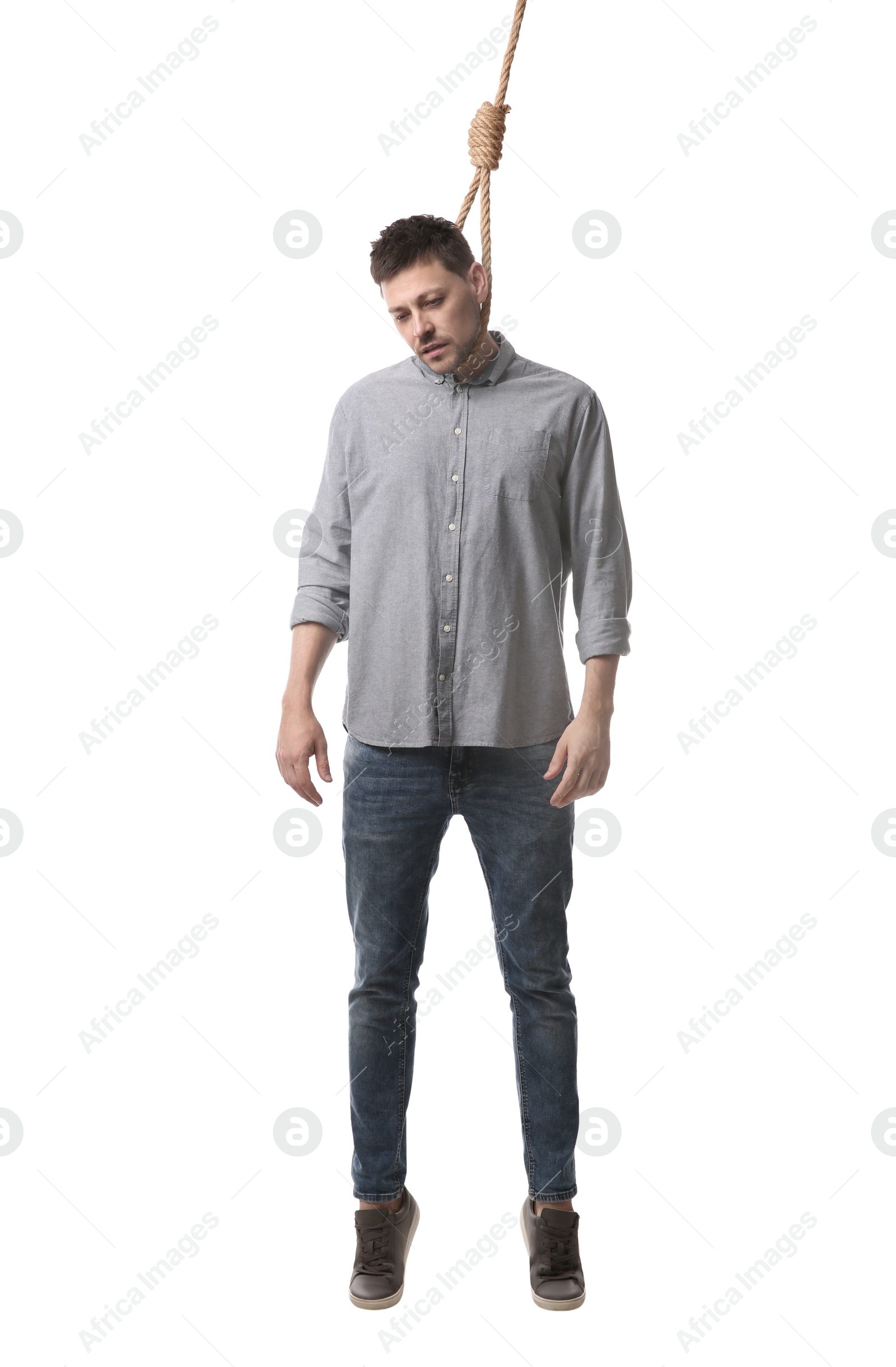 Photo of Depressed man with rope noose on neck against white background