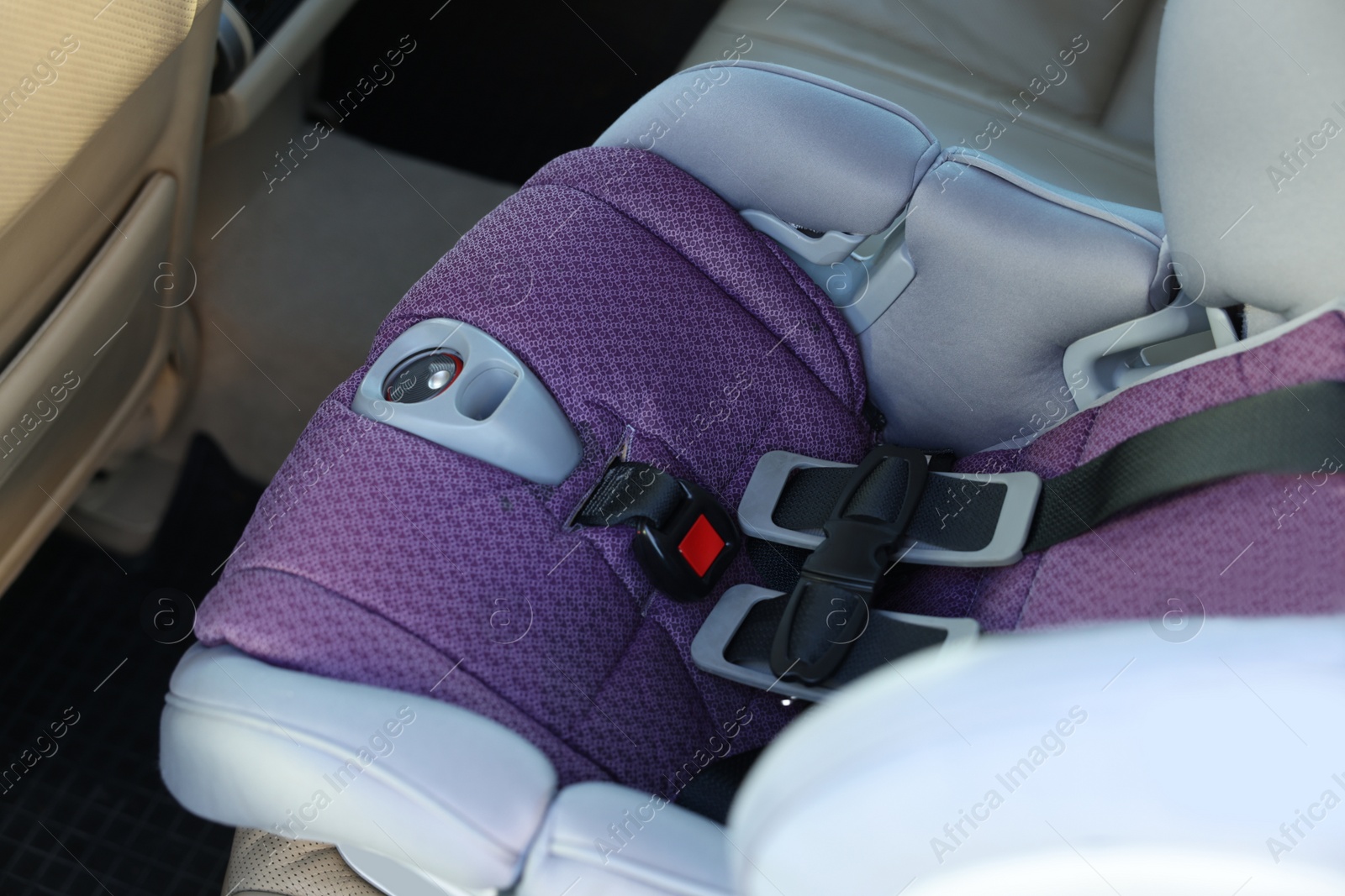 Photo of Empty modern child safety seat inside car