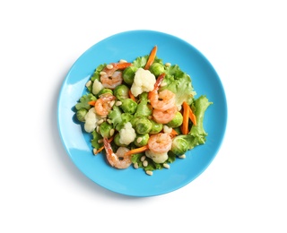 Photo of Plate of salad with Brussels sprouts isolated on white, top view