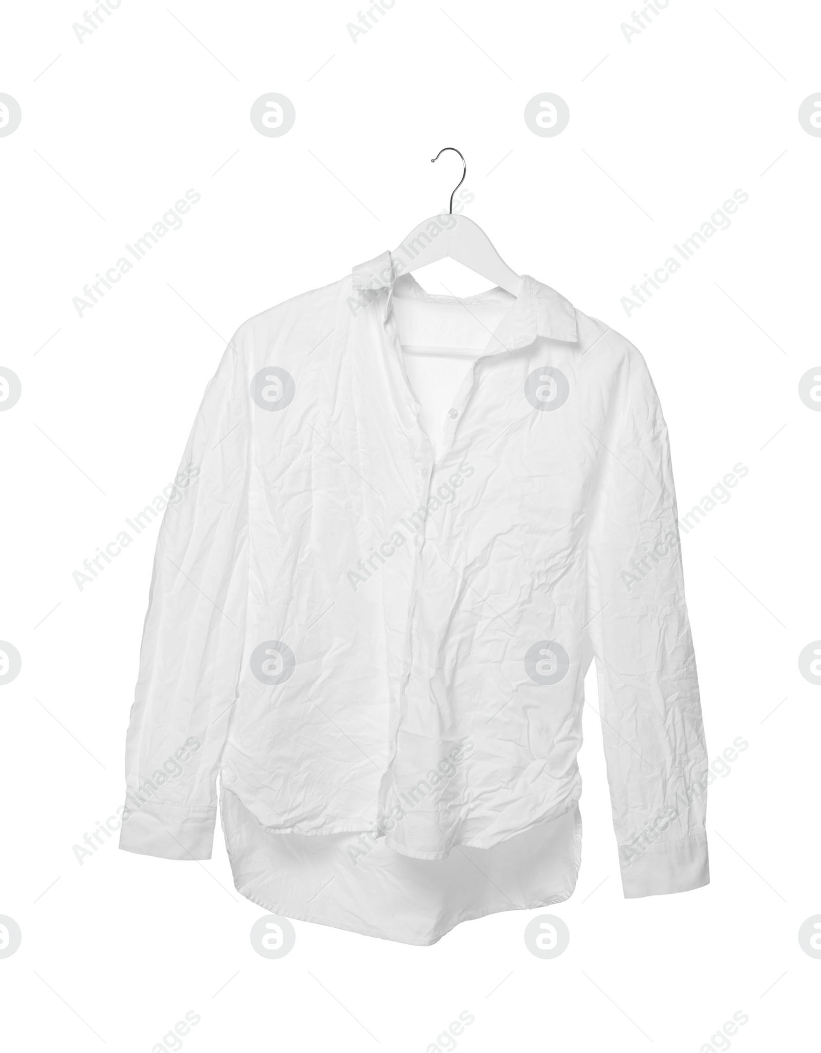 Photo of Crumpled shirt on hanger against white background