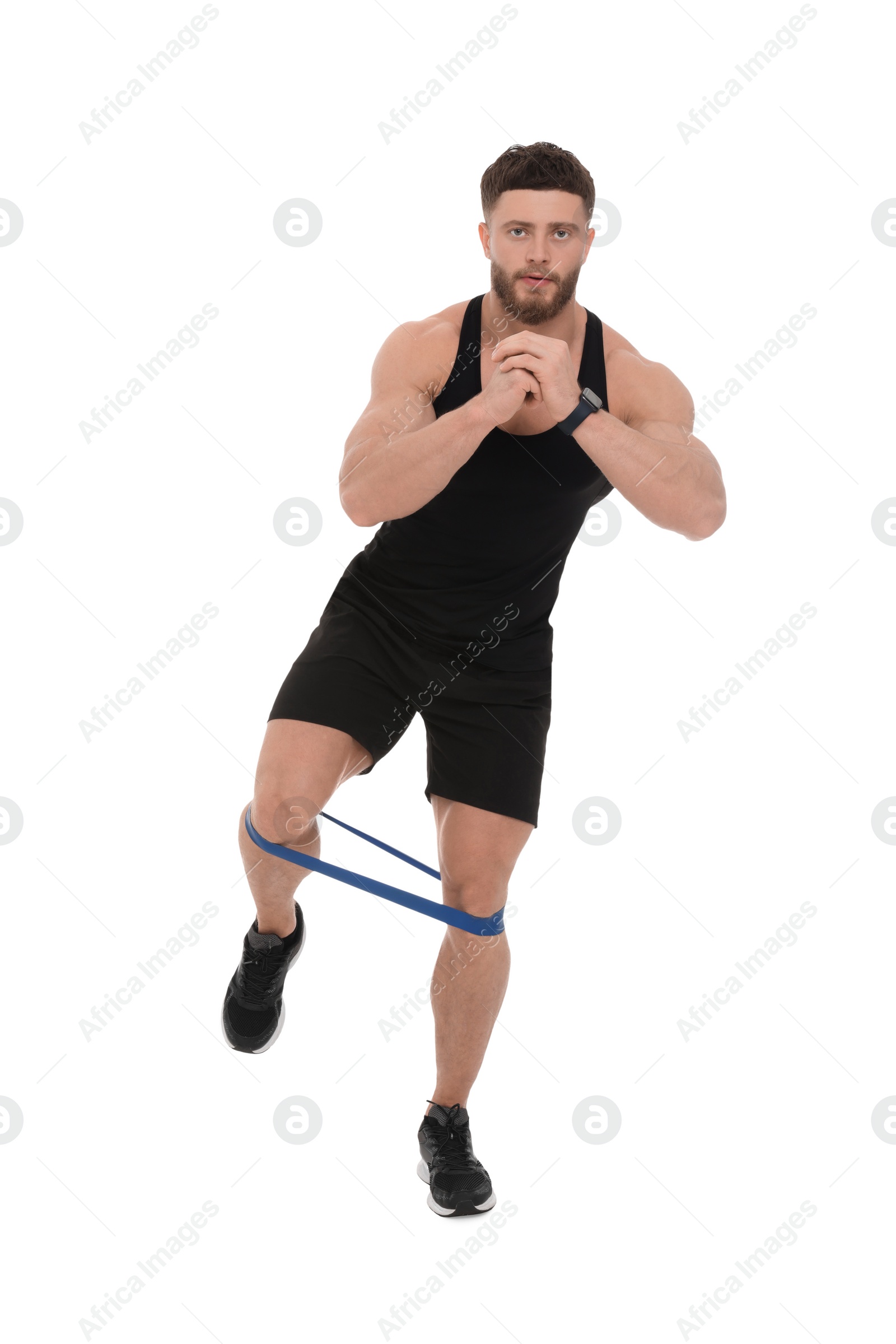 Photo of Young man exercising with elastic resistance band on white background