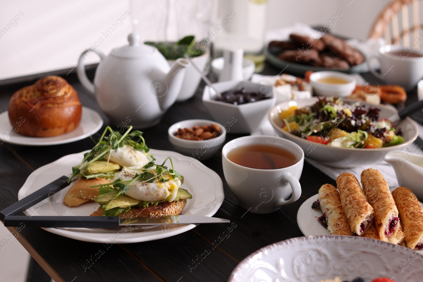 Photo of Many different dishes served on buffet table for brunch