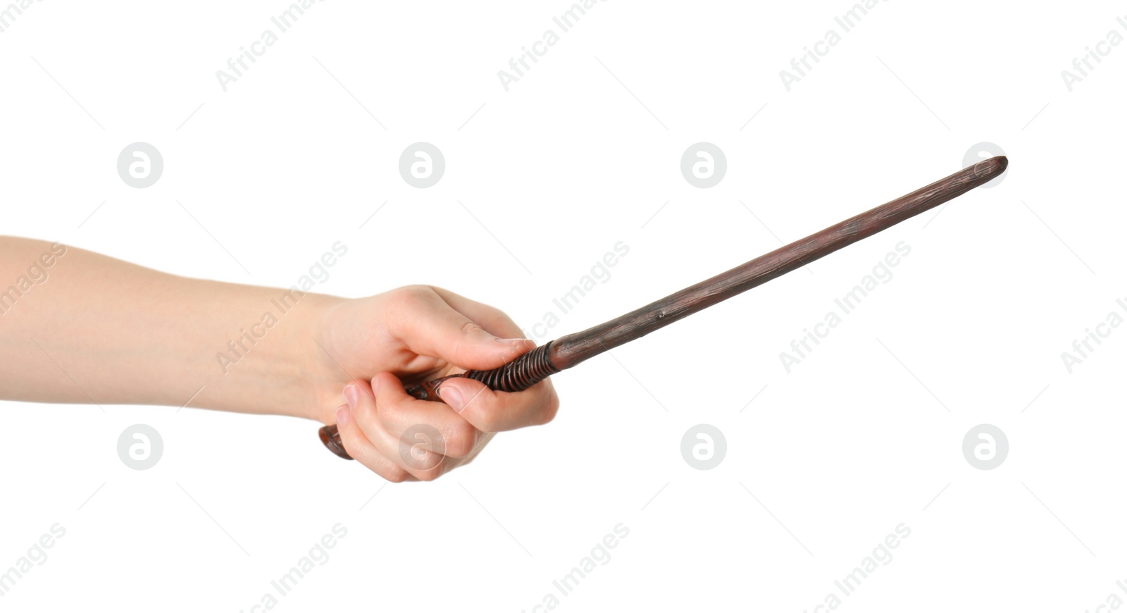 Photo of Woman holding wooden magic wand on white background, closeup