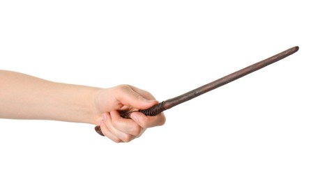 Photo of Woman holding wooden magic wand on white background, closeup