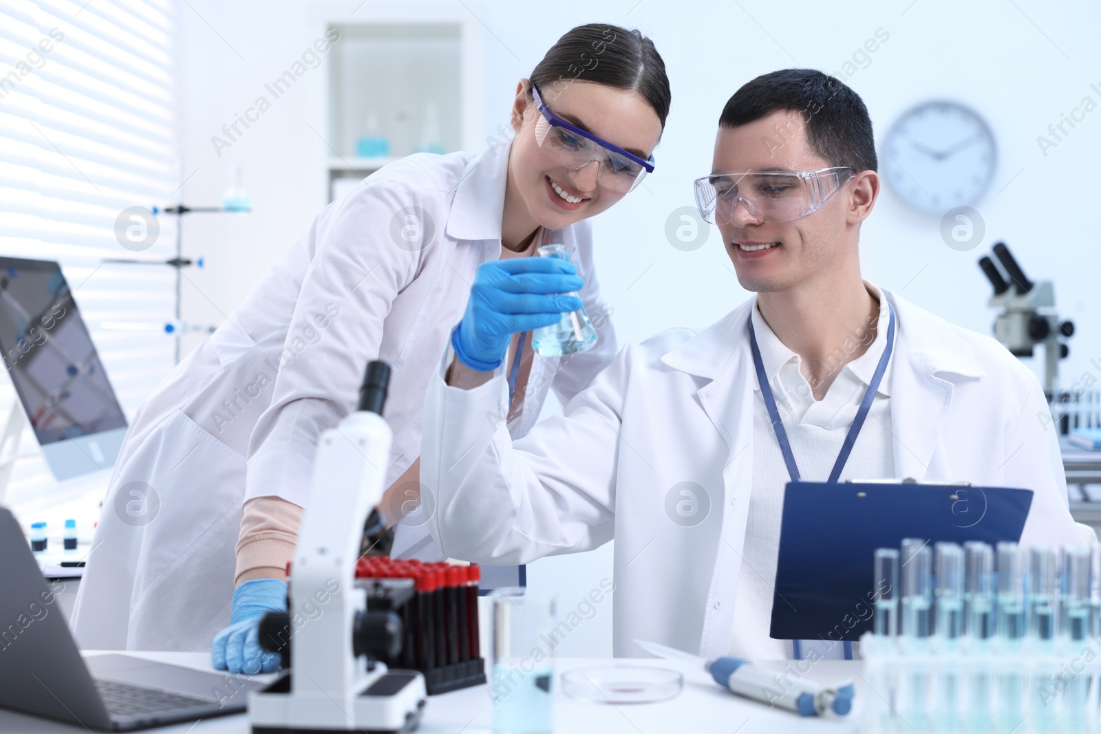 Photo of Scientists working with samples in laboratory. Medical research