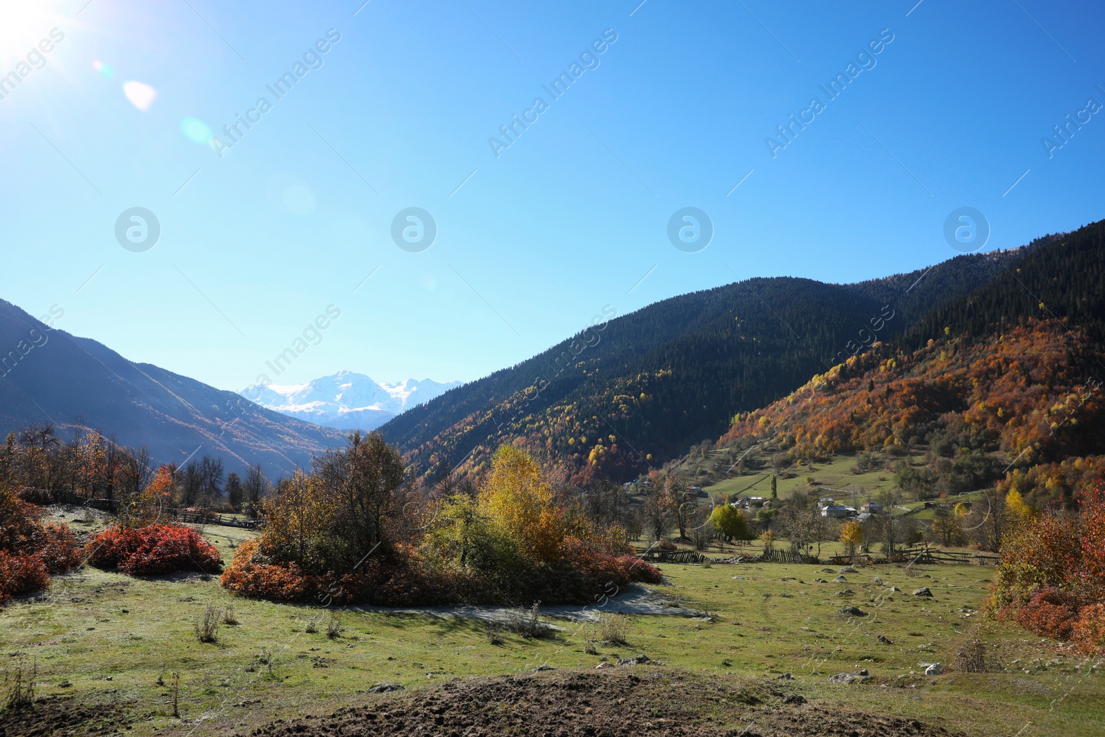 Photo of Picturesque view of beautiful high mountains under blue sky on sunny day