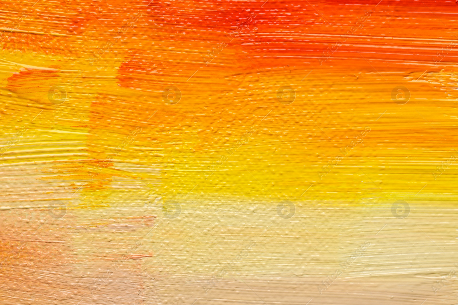 Photo of Beautiful strokes of colorful oil paints as background, closeup