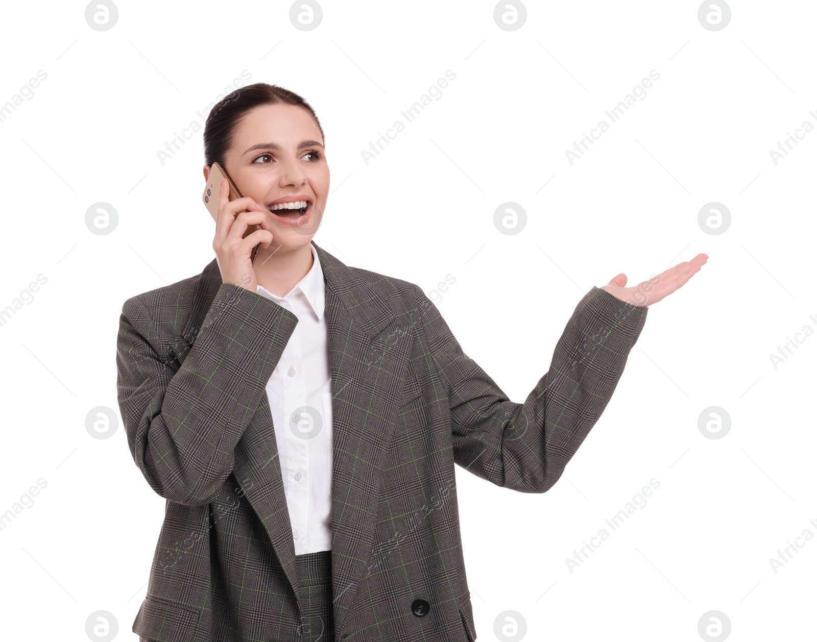 Photo of Beautiful emotional businesswoman talking on smartphone against white background