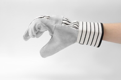 Photo of Woman in gardening glove on white background, closeup