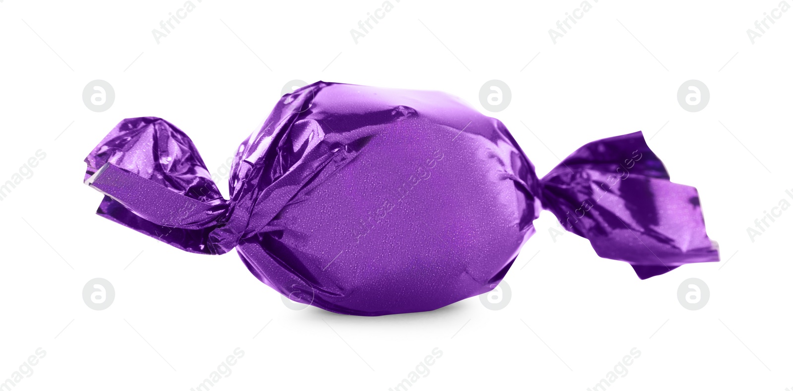 Photo of Candy in purple wrapper isolated on white