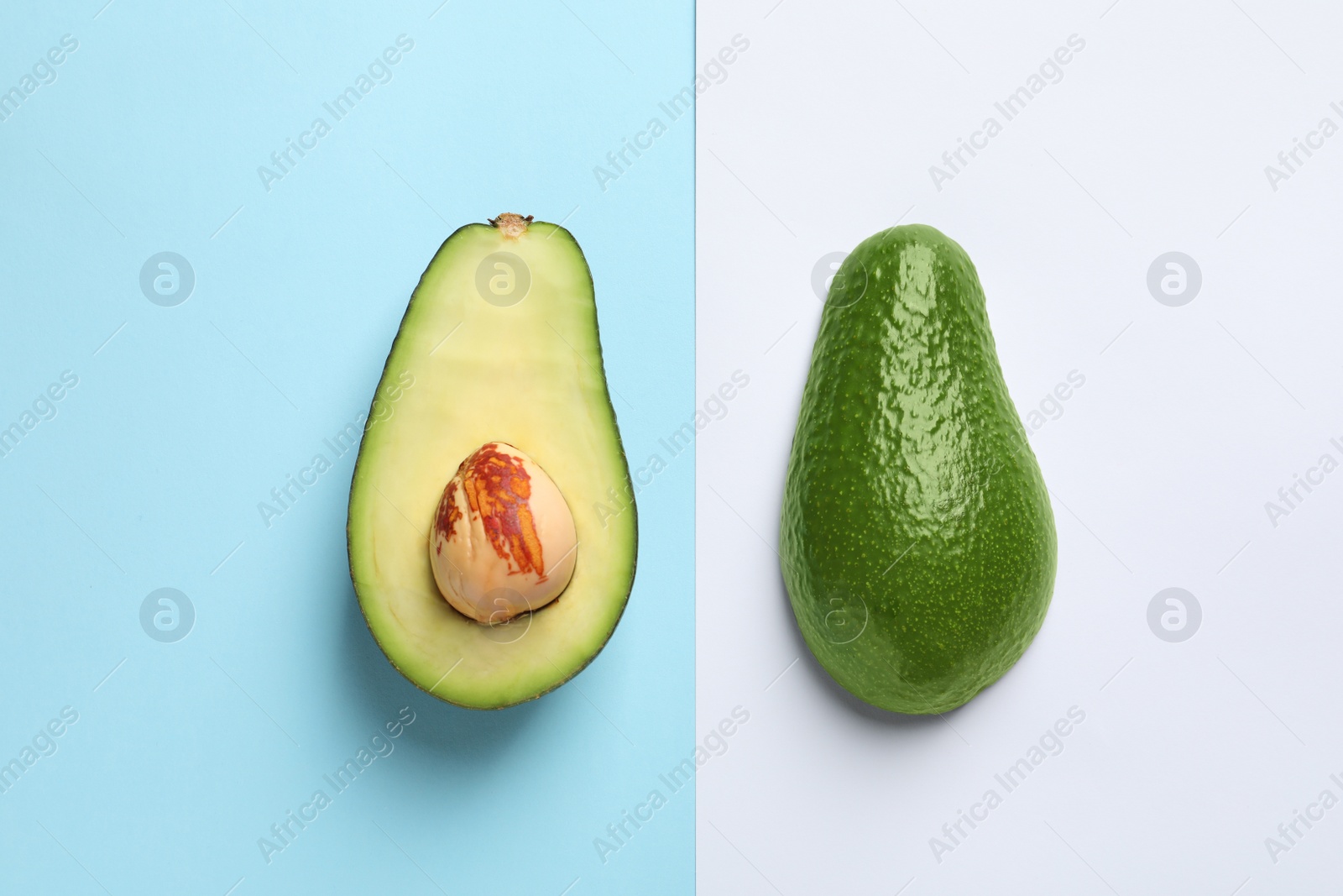 Photo of Flat lay composition with fresh avocado on color background