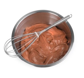 Whisk and bowl with chocolate cream on white background, above view
