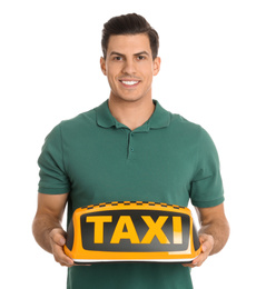 Photo of Man holding taxi sign on white background