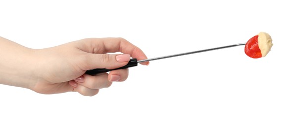 Tasty fondue. Woman holding fork with tomato and melted cheese on white background, closeup