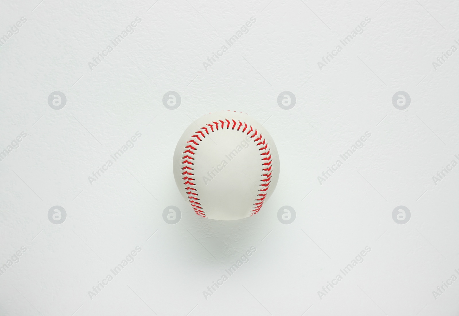 Photo of Baseball ball on white background, top view. Sports game