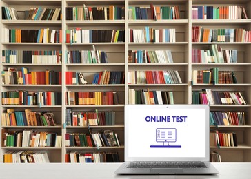 Image of Laptop with online test on screen in library