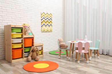 Child's room interior with stylish furniture and toys