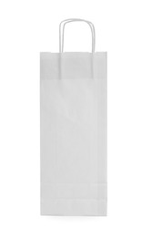 Photo of Blank paper bag isolated on white. Mockup for design