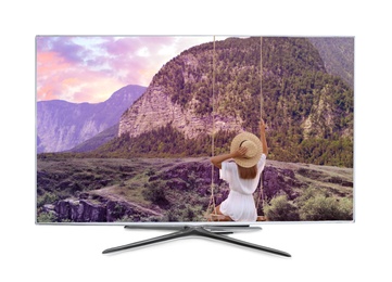 Modern wide screen TV monitor showing girl in mountains, isolated on white