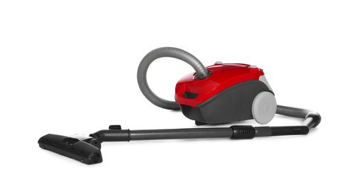 Modern red vacuum cleaner isolated on white