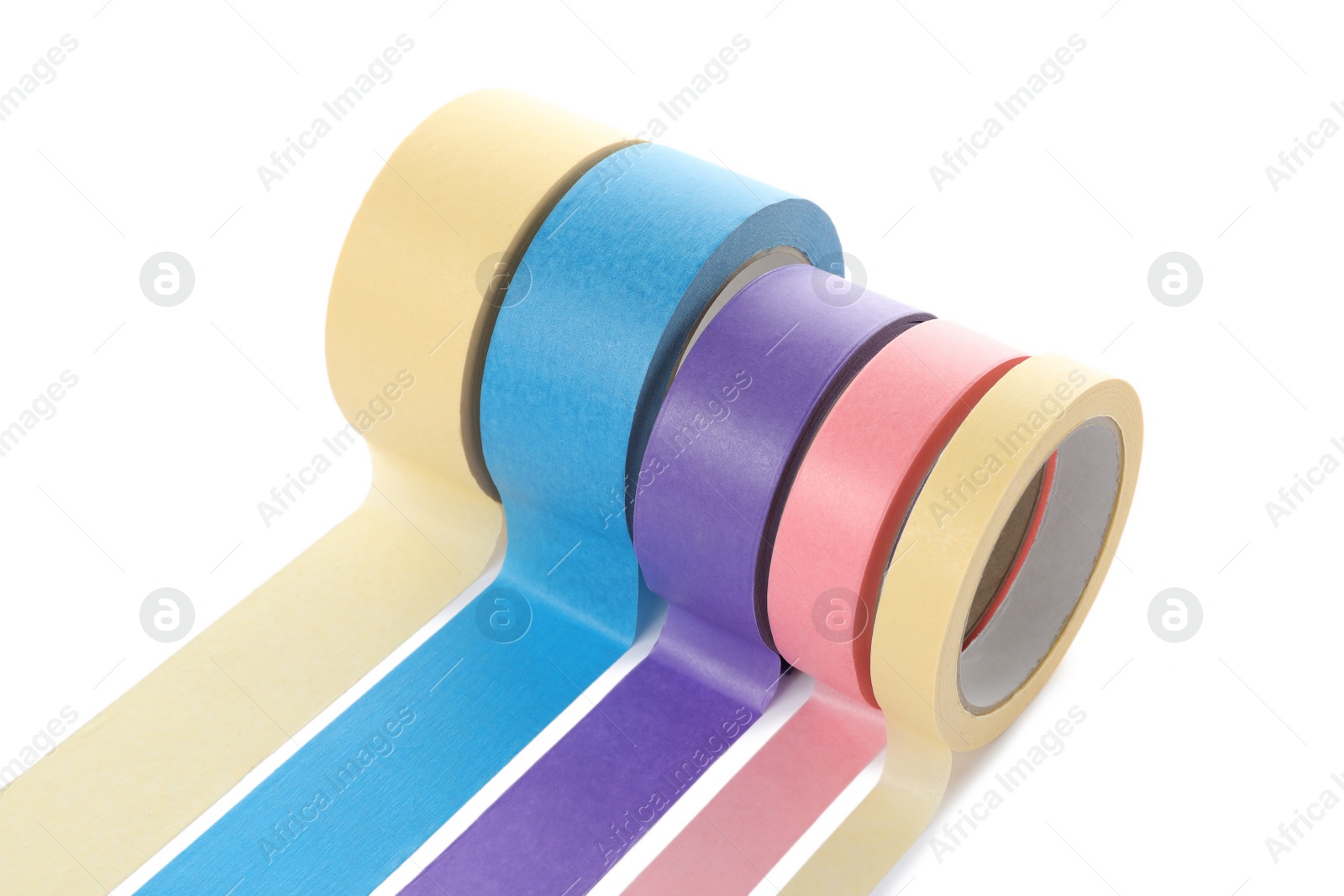 Photo of Many different rolls of adhesive tape on white background