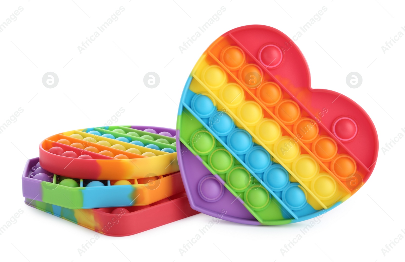 Photo of Rainbow pop it fidget toys on white background