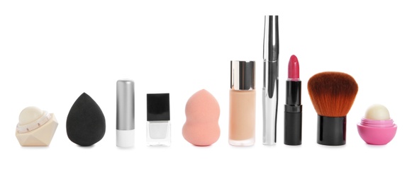 Photo of Set of makeup products on white background