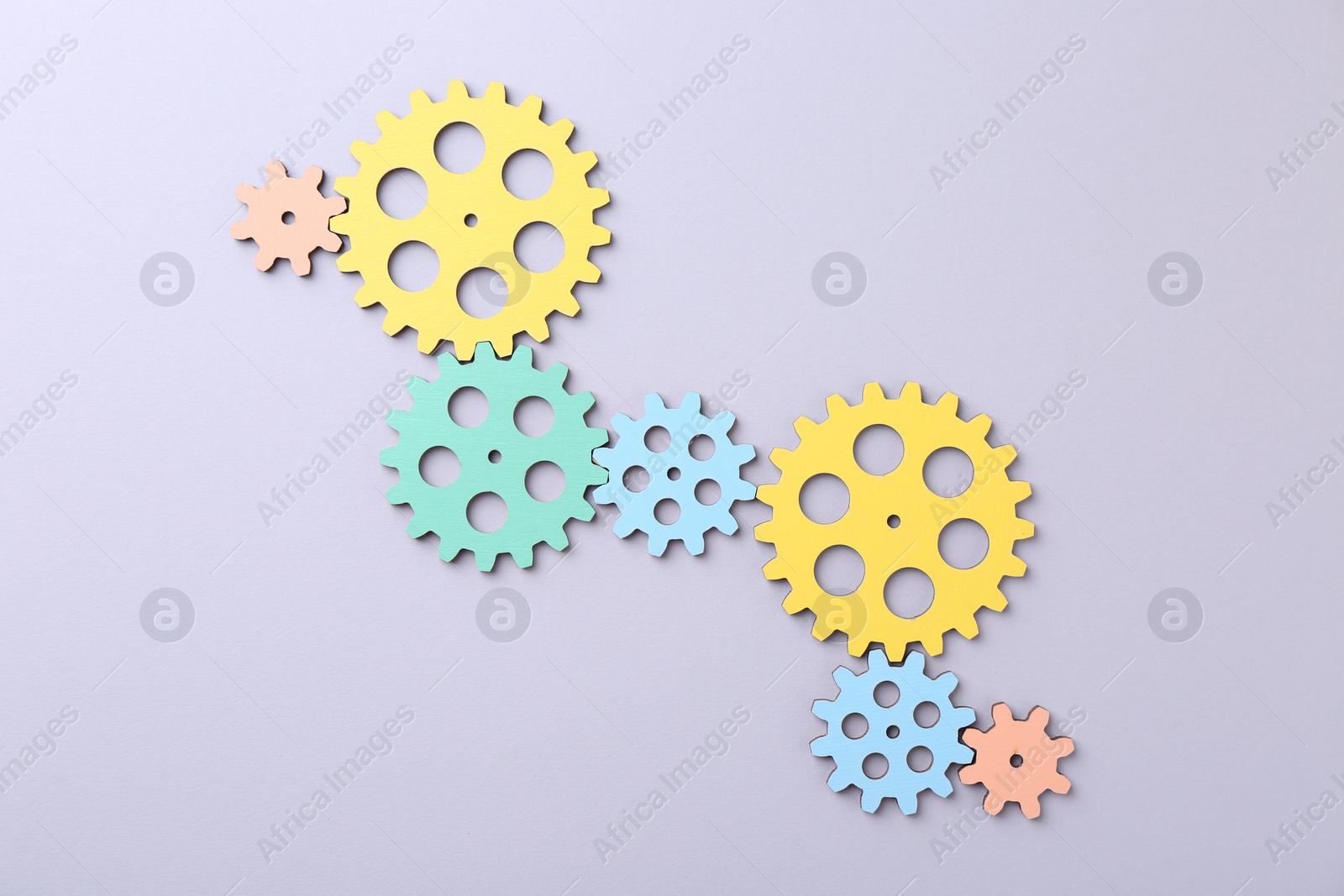 Photo of Business process organization and optimization. Scheme with colorful figures on light background, top view