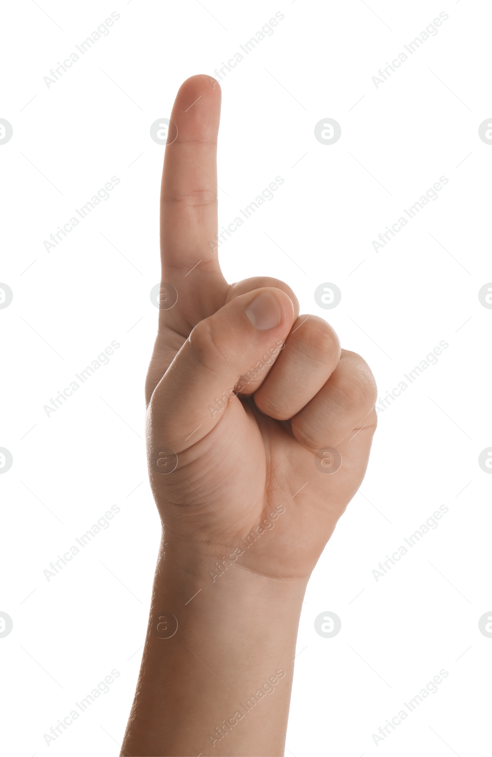 Photo of Teenage boy pointing at something on white background, closeup