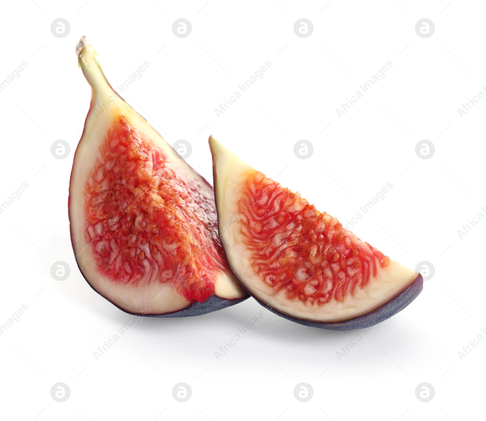 Photo of Pieces of ripe purple fig on white background