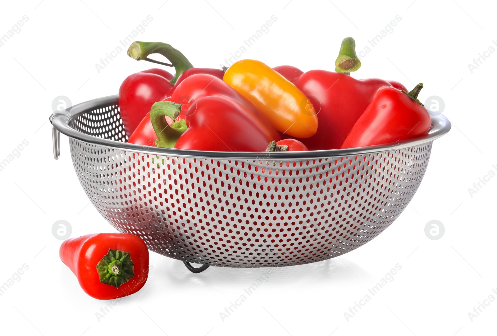 Photo of Colander with fresh bell peppers isolated on white