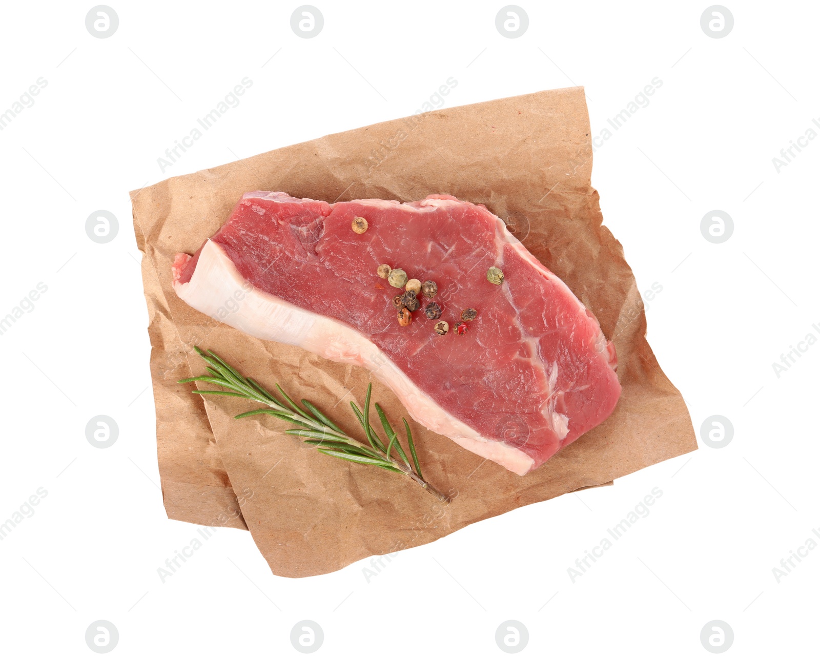 Photo of Steak of raw beef meat and spices isolated on white, top view