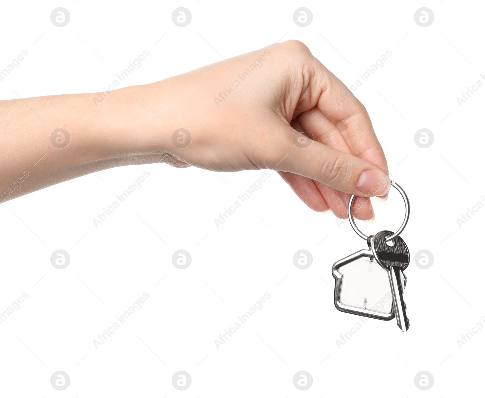 Photo of Woman holding house key with trinket on white background, closeup