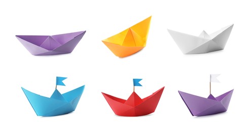 Image of Set with multicolor paper boats on white background. Banner design