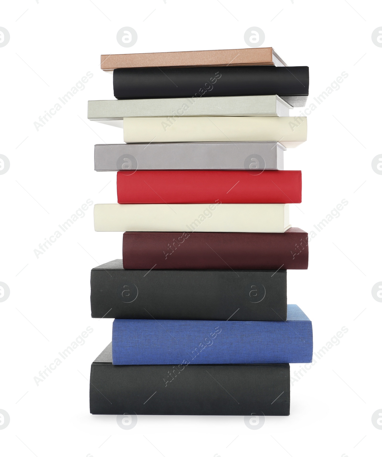 Photo of Many different books stacked on white background