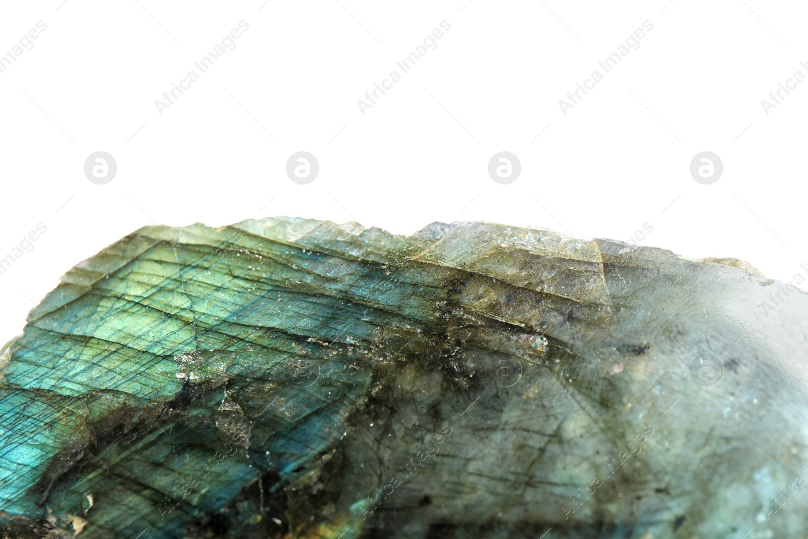 Photo of Beautiful labradorite gemstone on white background, closeup